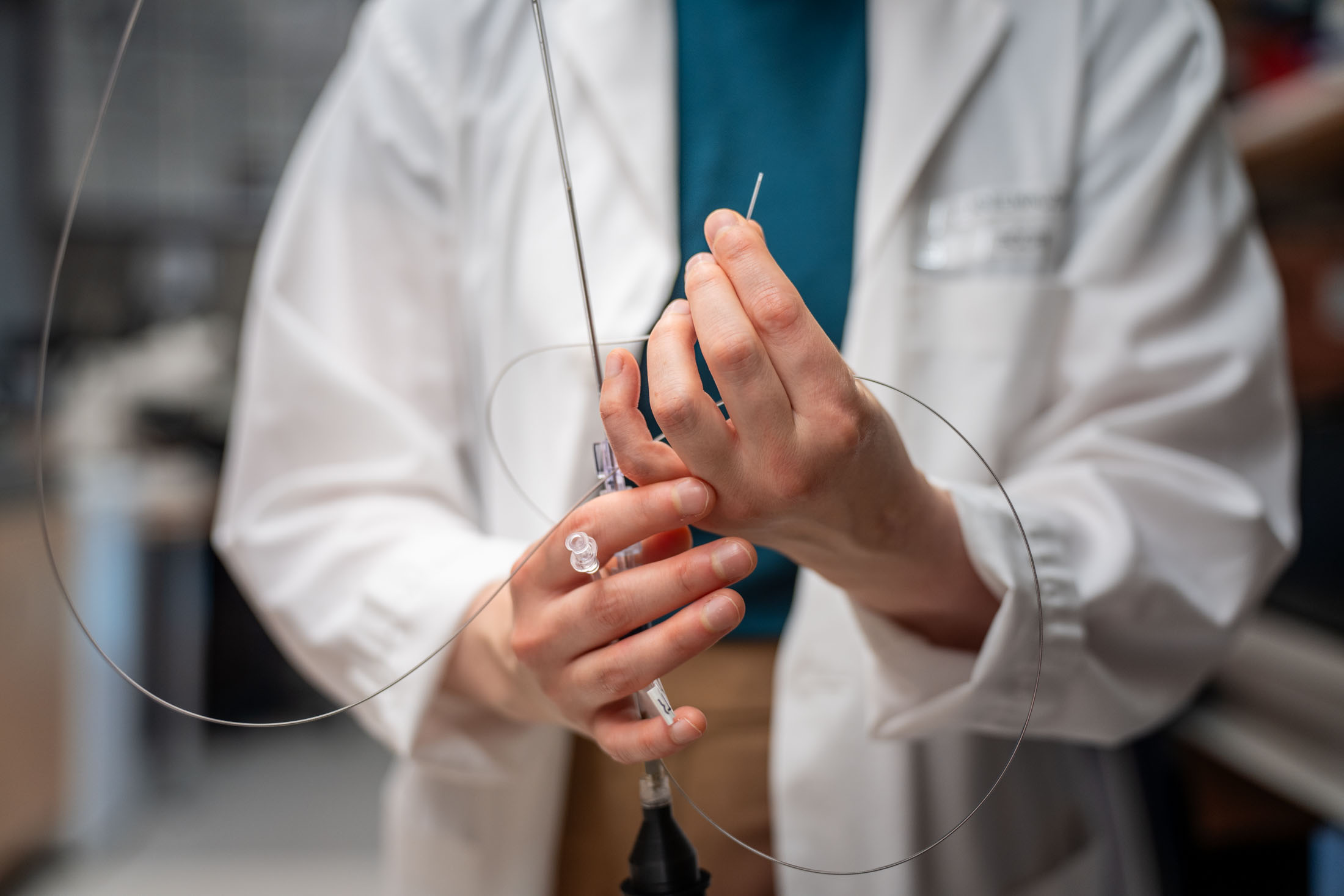 Medical professional demonstrating a medical device